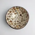 Detailed top view of natural coconut bowl with handmade iridescent seashell inlay - Camel Polka Dot Style