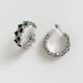 Silver C-shaped earrings featuring two rows of emerald green inlaid cubic zirconia - Green Zirconia / Silver