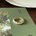 Golden open ring with bamboo texture and pearl inlay on a vintage book backdrop - Pearl Bamboo Texture (J3670)