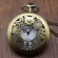 Macro detail of bronze hollow pocket watch with bear and Eiffel Tower relief carving - Style 3 (P364) Rilakkuma Hollow