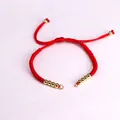 Handmade red woven Milan rope bracelet with golden beads and adjustable sliding clasp - Red
