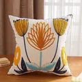 Beige floral embroidery throw pillow cover with yellow flowers on a rustic wooden table - Yellow Lotus / 45x45 Case Only
