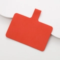 Dettaglio dell'inserto per cordino cellulare in velluto rosso con trama intrecciata - Arancione
