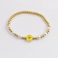 Bracciale minimalista in rilievo placcato oro con perle bianche e ciondolo a cuore giallo - Giallo