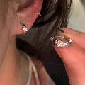 Macro detail of silver star hoop earring with black and white zircon stone pavé - E6056 Silver Black/White Star Hoop