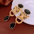 Macro detail of vintage gold leopard earrings with black teardrop gemstone and crystals - Gold Leopard Head Black Gemstone Vintage Earrings (13#)