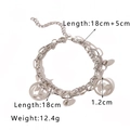 Detail of silver double-layer stainless steel Capricorn bracelet with two coin charms - Capricorn Style (NB-B1094-MJ)