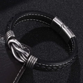 Detalle de pulsera para hombre de cuero trenzado negro con nudo metálico y cierre magnético - Circunferencia Interior 165mm / Cuero Negro [Color Acero]