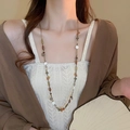 Close-up of vintage multi-strand beaded necklace with stones and coin fringe tassels - Round Shell Natural Stone Crystal Necklace