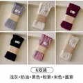 6-pack cotton knit crew socks with ruffle cuffs and brand label in mixed pastel colors - Combination Set