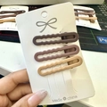 Set of three matte brown and tan seamless hair clips on a white display card - Lace Wave Style 3Pcs Set