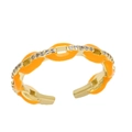 Detailed macro view of orange enamel and clear zircon stones on the golden ring band - Adjustable Open / Orange