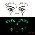 Detailed view of luminous face jewel stickers showing glow-in-the-dark effect for party - YJ-26