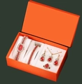 Luxury gold watch set with red rhinestones and jewelry in a vibrant orange gift box - Gold/Red Set
