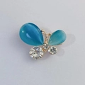 Golden butterfly brooch pin with lake blue cat eye stones and sparkling rhinestones - Blue Butterfly with Water Drop