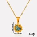 Macro shot of gold heart pendant with dimensions 1.2cm by 1.0cm and 3.3g weight - Gold Abalone Shell Necklace (S1999-G-B-N22)