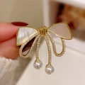 Elegant gold bow brooch with mother-of-pearl inlay, rhinestones and pearl drops - 342# Bowknot