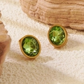 Elegant gold earrings with oval green crystal stones on a natural rock background - Green Oval Stud Earrings (BD512-green)