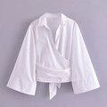 Elegant white wrap blouse with V-neck, flare sleeves, and waist-tie on lilac background - XS / White