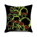 Halloween throw pillow case with green skulls and red eyes on black fabric - Red-Eyed Green Skull Matrix