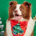 Close-up of a festive red Christmas pet bandana with a white tree and snowflake print - Red Gift Boxes Christmas Tree Style