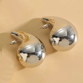 Macro shot of minimalist gold teardrop earrings with a high-polished mirror finish surface - Large Silver Water Drop Earrings