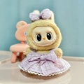 Plush doll accessory featuring a purple plaid dress and matching bow for Labubu figure - Purple Candy Dress Pendant / First And Second Generation Keychains Are Compatible With La Cloth Dolls. Dolls Not Included.