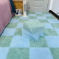 Green and blue plush puzzle floor mats in a minimalist bedroom home setting - Mint Green + Blue