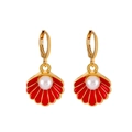 Golden shell earrings with red enamel coating and centered pearl inlay - Gold Tone Red Shell Earrings