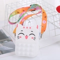 Detail of white silicone cat purse with pop-it bubbles and rainbow shoulder strap - White