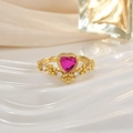 Macro detail of crown-shaped gold ring with pink heart stone and floral pave accents - Pink Heart Floral Crown (JZ0139C)