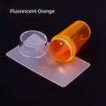 Macro detail of fluorescent orange nail art stamper kit with clear cap and scraper tool - Single Head Stamper Style / Fluorescent Orange