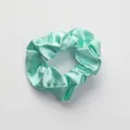 Elegant mint green satin scrunchie with a glossy silk-like finish and soft pleats - Scrunchie_Light Green