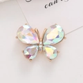 Macro shot of zinc alloy butterfly charm with iridescent crystals on a clean white background - D1996 Crystal Gem Butterfly (AB Color)