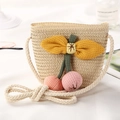 Beige woven straw bucket bag for kids with pink cherry charms and twisted shoulder strap - Pink Pom-pom / Beige