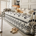 Chenille bankhoes met zwart-wit geometrisch patroon en afgewerkt met franjes - 180x420cm / Zwart