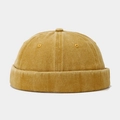 Detail view of mustard yellow vintage miki hat showing washed cotton texture and stitching - Yellow