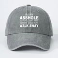 Washed grey cotton baseball cap with white ASSHOLE WALK AWAY print on front - Gray