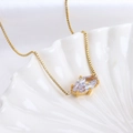 Golden box chain necklace featuring a marquise-cut clear zircon pendant in a shell - Sagittarius