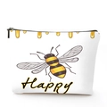 Detailed close-up of a linen makeup bag featuring a cartoon bee and Happy text print - Happy Bee