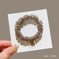 Beaded crystal hair tie in champagne grey with a gold circular pendant and 5.5cm diameter - Grey Crystal Tag Scrunchie