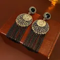Vintage portrait coin earrings with black tassel chains and antique gold finish - Silver Pin Gold Portrait Tassel Style