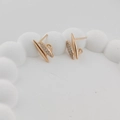 Elegant rose gold shuttle-shaped geometric stud earrings with micro-pave cubic zirconia - Geometric Spindle Pave / Rose Gold