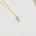 Gold-plated choker necklace featuring a blue enamel dolphin pendant in a minimalist style - Blue Dolphin