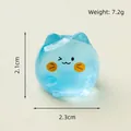 Blue translucent miniature resin cat figurine with cute blinking expression for DIY decor - Glow In The Dark Blue Kitten