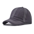 Close-up of charcoal cotton baseball cap with white contrast stitching and distressed brim - Adjustable / Gray