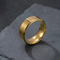 Classic 8mm wide gold stainless steel ring with mirror finish on a stone texture - Gold Glossy