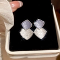 Close-up of elegant blue enamel square earrings with ripple texture in a black velvet box - 73# Silver Wavy Double Layer White Purple Square Studs