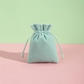 Light mint green velvet jewelry drawstring pouch with soft texture on a pastel background - 7*9cm / Green