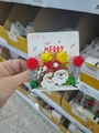 Christmas hair clip set featuring Santa Claus, plush balls, and bells on display card - 43# Santa Claus Bell Pom Pom Pair Clips